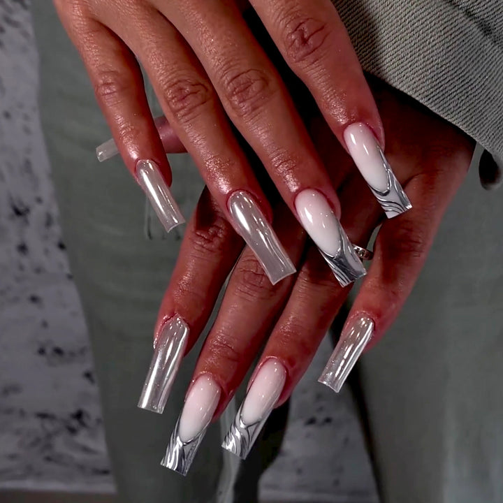 Artificial nail extensions with marbled design Stornfield