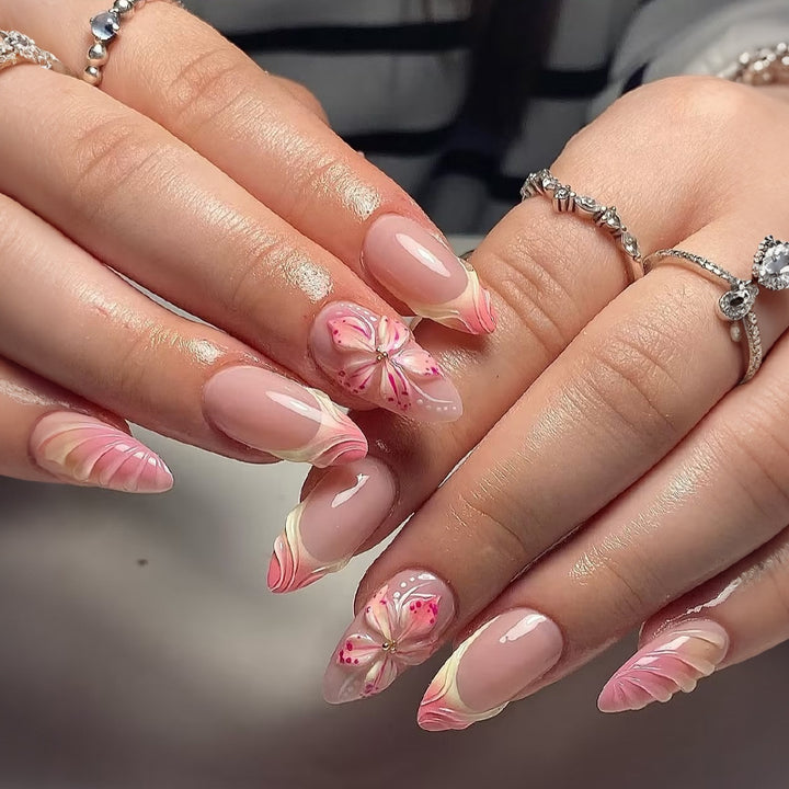 Artificial nail set with delicate floral designs and modern ombre effects Stornfield