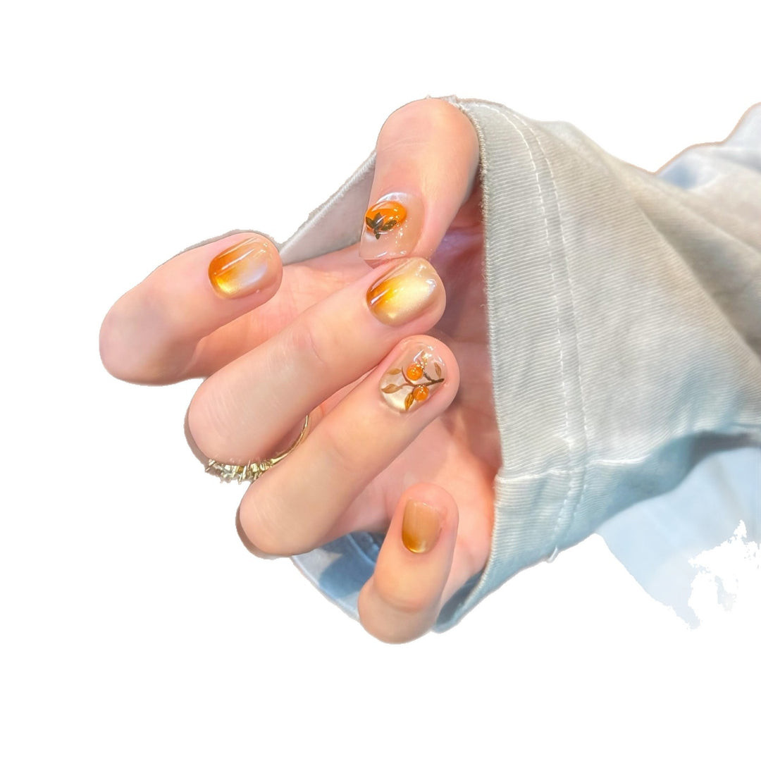 Artificial nails in elegant ombre look with floral accent Stornfield