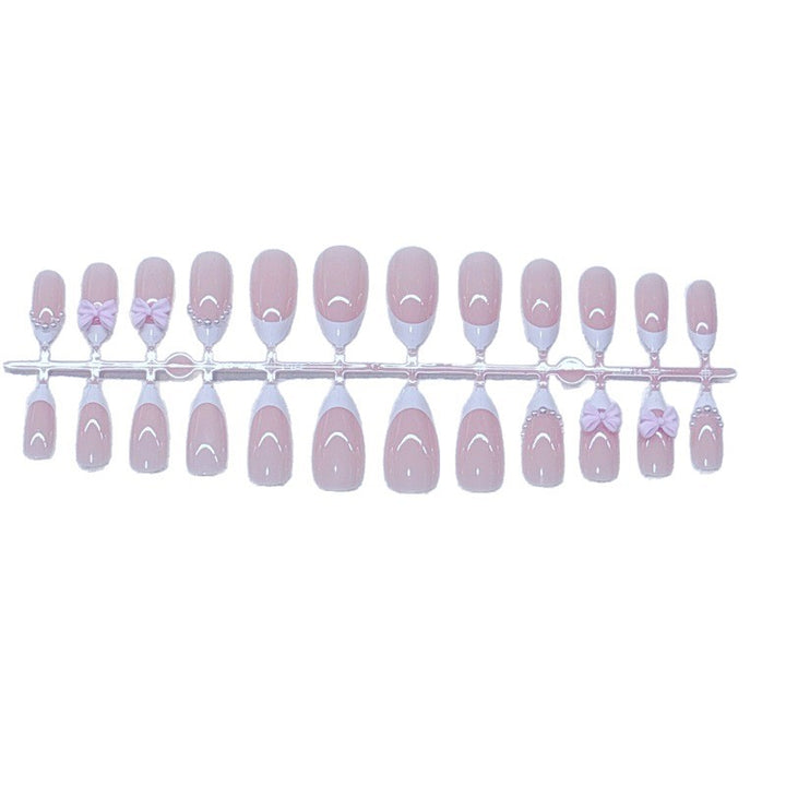 Elegant Artificial Nails with Bows and Pearl Design Stornfield