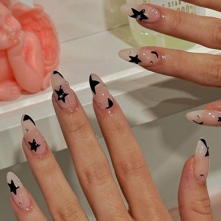 Acrylic nail set with glamorous star designs and elegant lace designs Stornfield