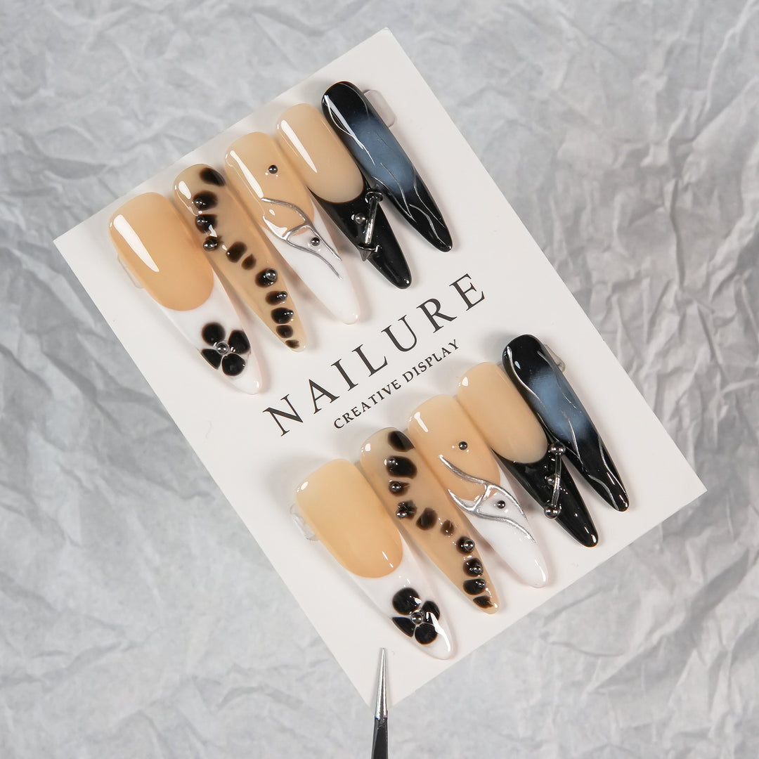 Artistic Stiletto Press-On Nails with Unique Patterning