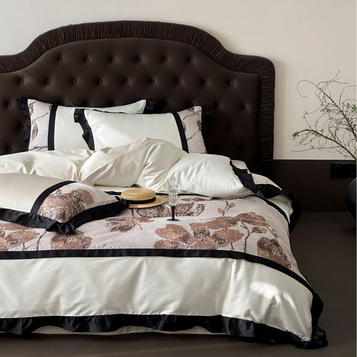Premium bedding set made of cotton satin with floral jacquard and contrasting frill