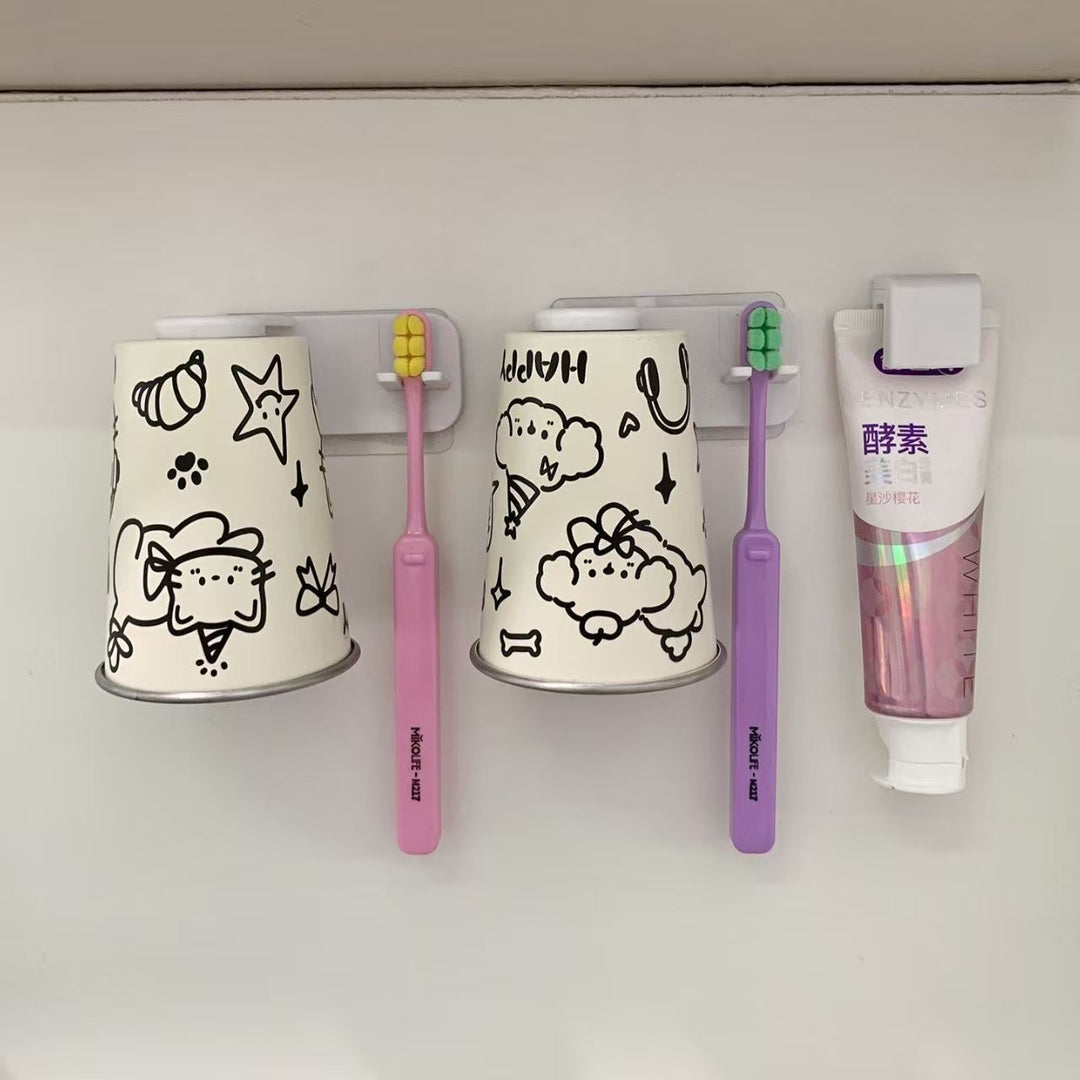 Wall-mounted toothbrush holder with playful animal design Stornfield