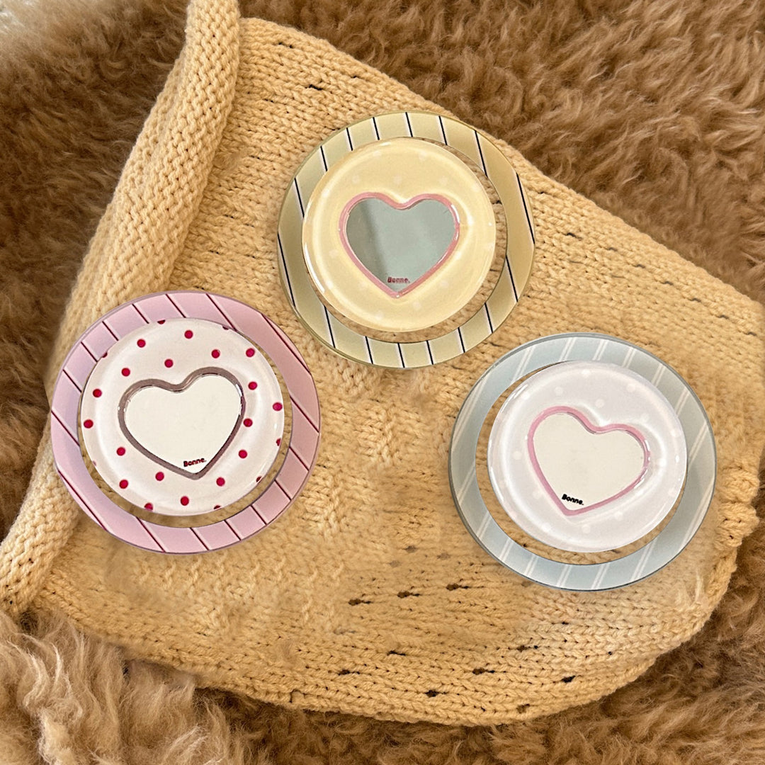 Heart-shaped coaster with playful design Stornfield