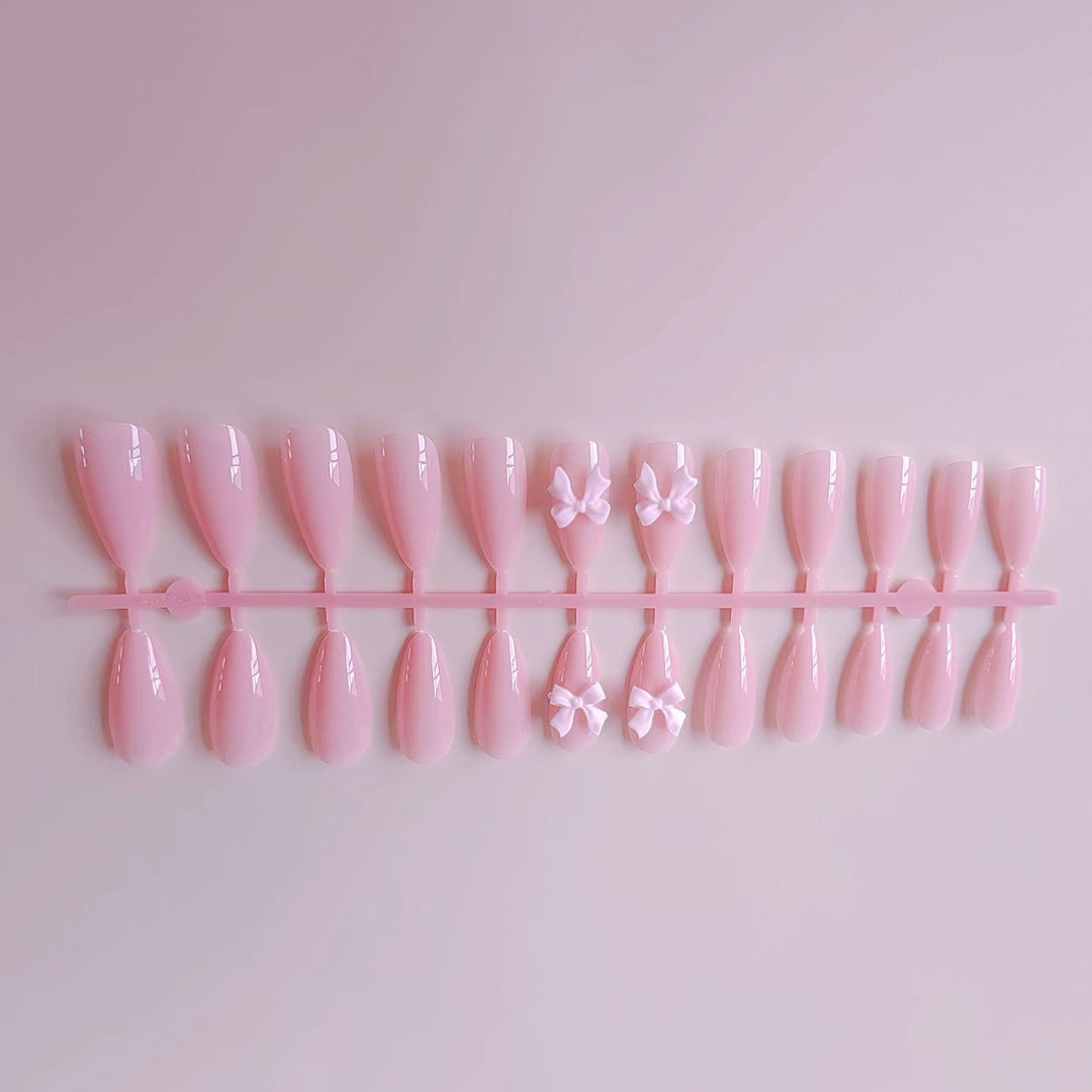 Artificial nails with elegant bow accents Stornfield