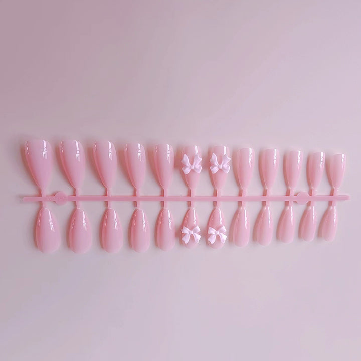 Artificial nails with elegant bow accents Stornfield