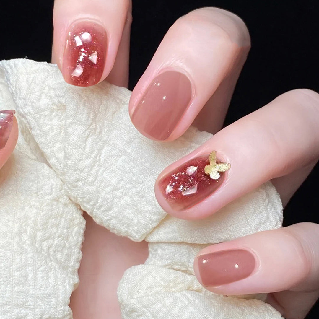 Exquisite Nail Art with Glitter and Flower Patterns Stornfield