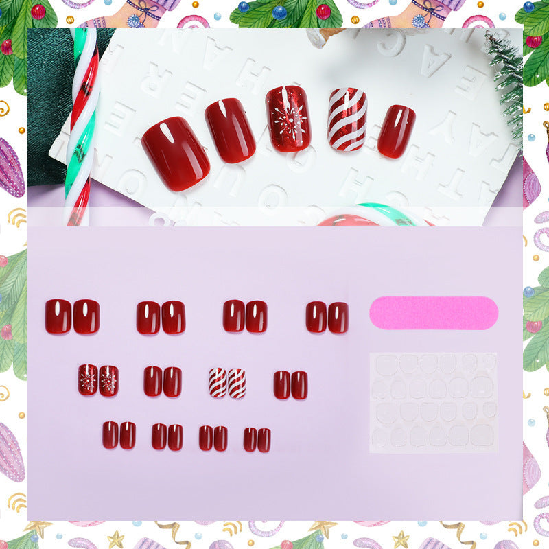 Artificial nail set with festive designs and glitter accents Stornfield