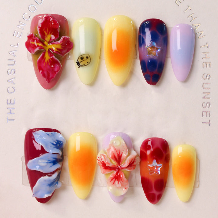 Artificial nail set with floral 3D accents and colorful designs Stornfield