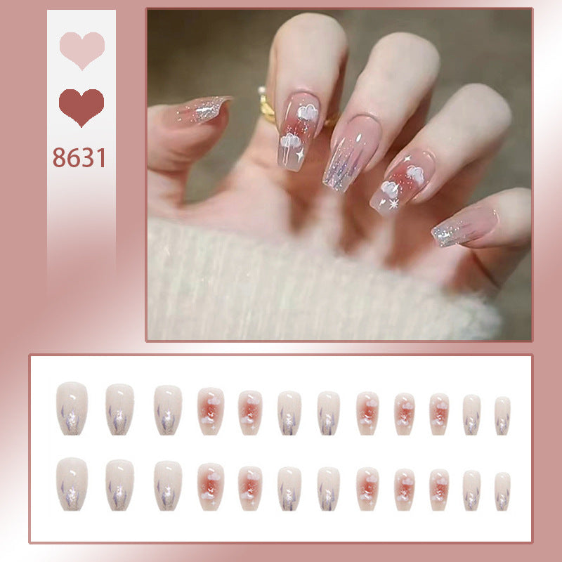 Artificial nail set with floral design and glitter accents Stornfield