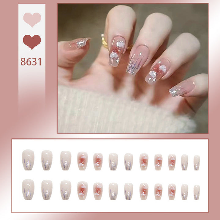 Artificial nail set with floral design and glitter accents Stornfield