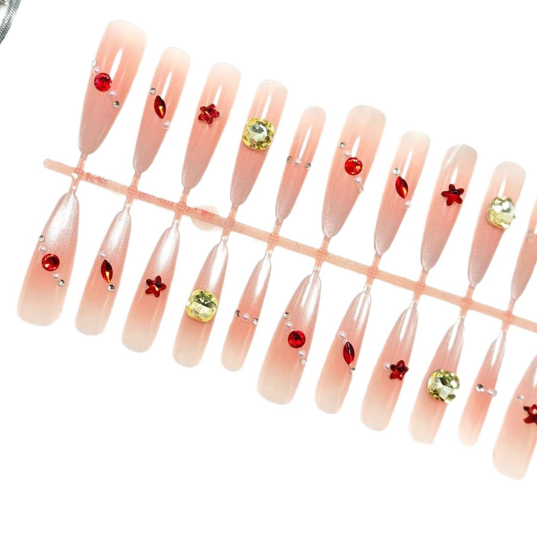 Glamorous artificial nails with shimmering embellishments Stornfield