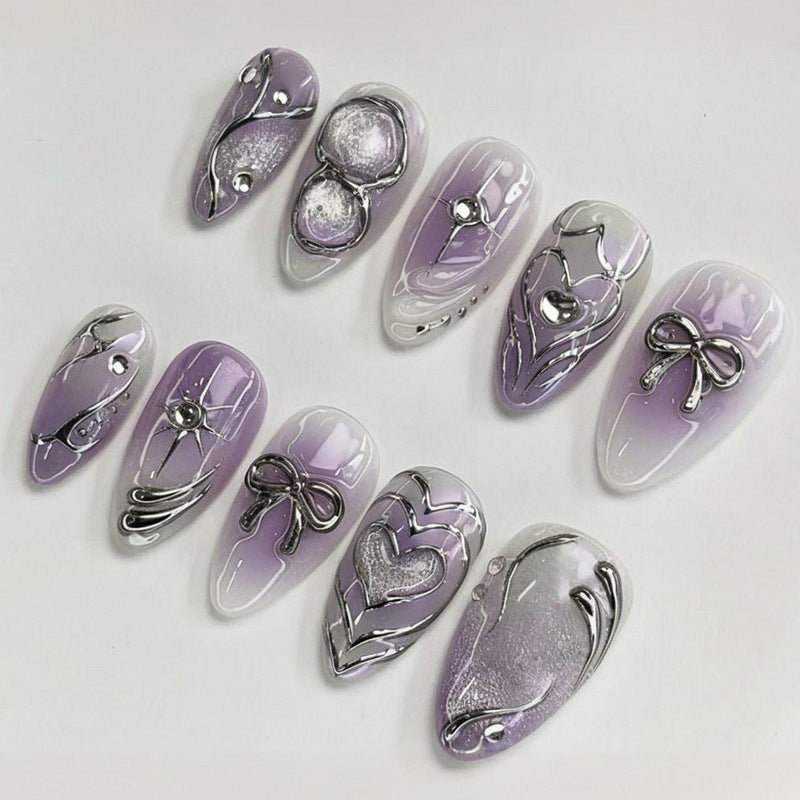 Nail art set with elegant flower and glitter accents Stornfield