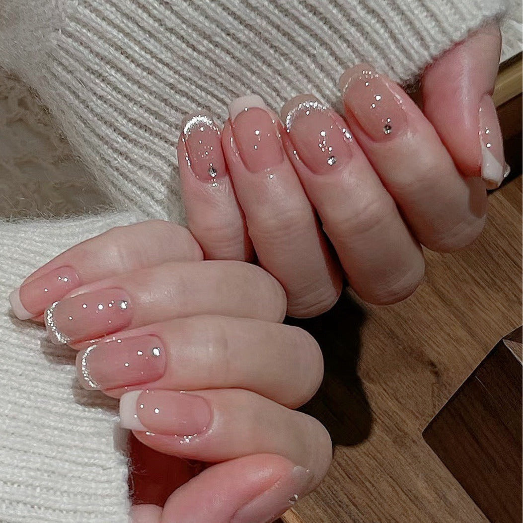 Glamorous artificial nails with filigree rhinestone details Stornfield