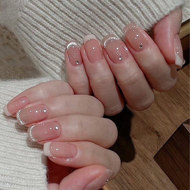 Glamorous artificial nails with filigree rhinestone details Stornfield
