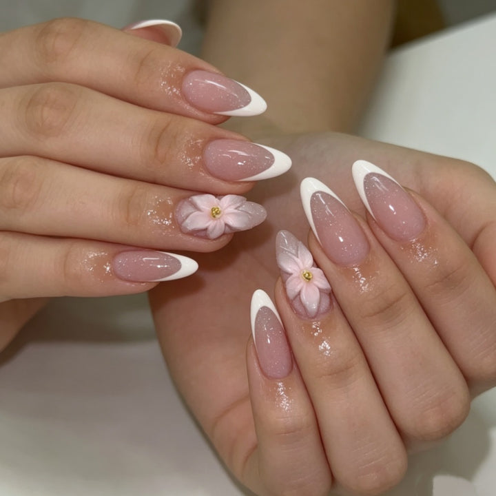 Artificial nails with floral decoration and elegant French tip design Stornfield