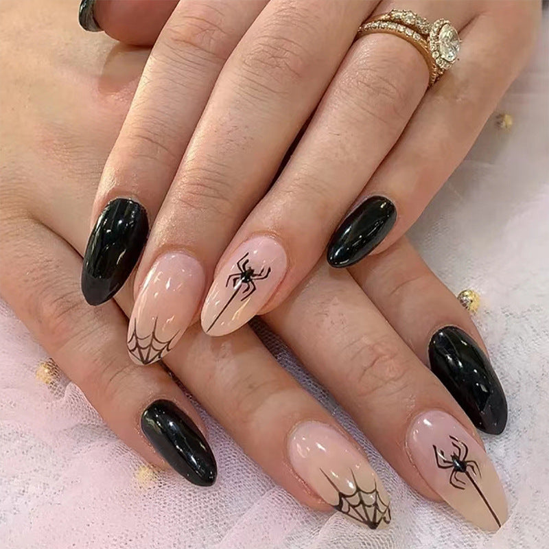 Artistic nail art with spider motif Stornfield