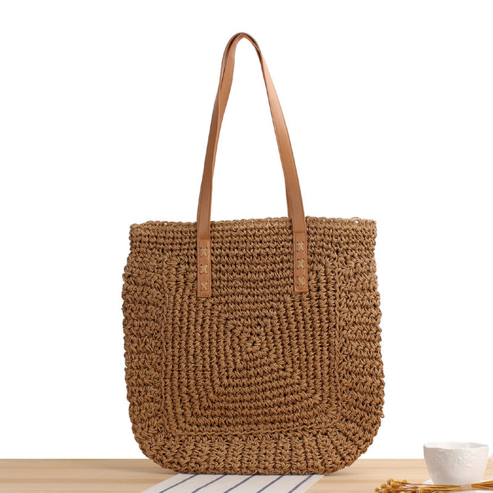 Natural bast shoulder bag with leather handles Stornfield