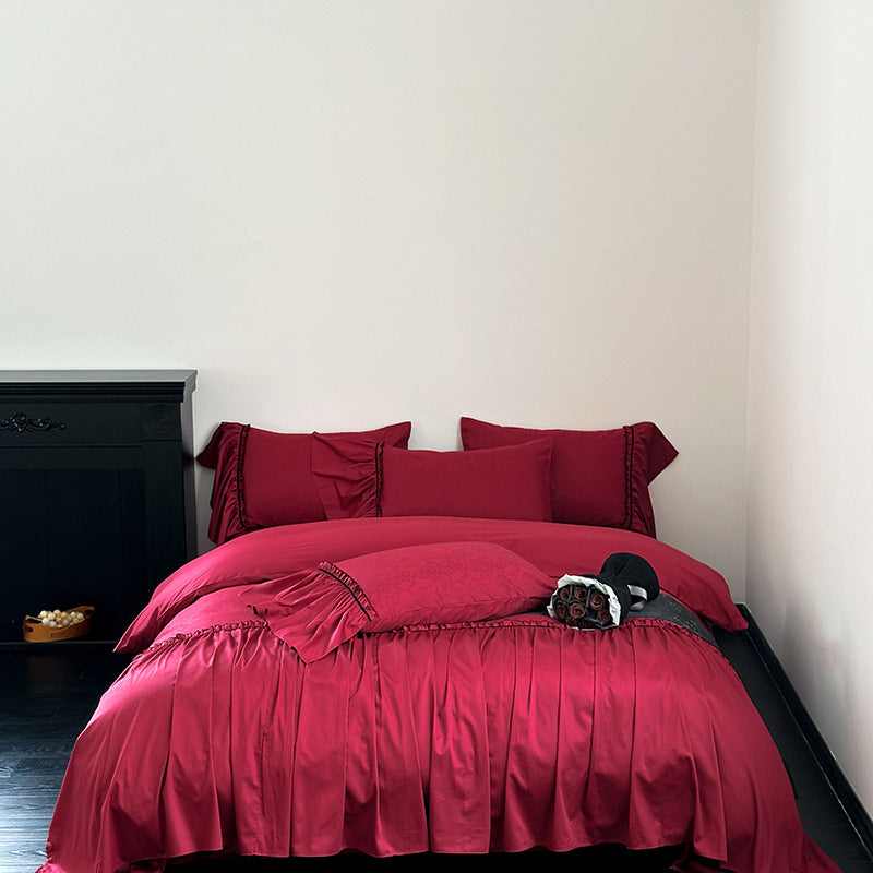 Elegant satin bedding set with pleated detail, jacquard design & ruffle