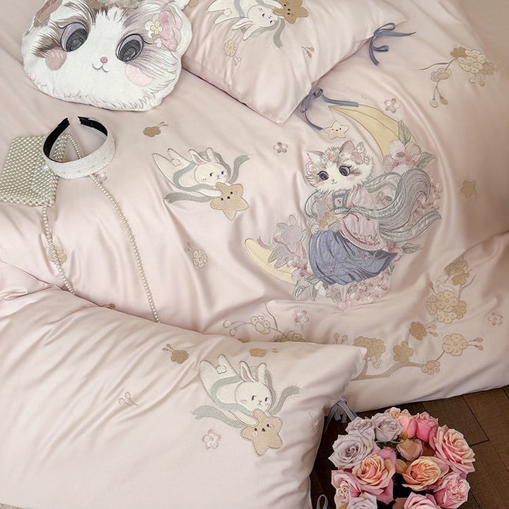 Exclusive satin bed linen set with detailed embroidery of cats and moon motif