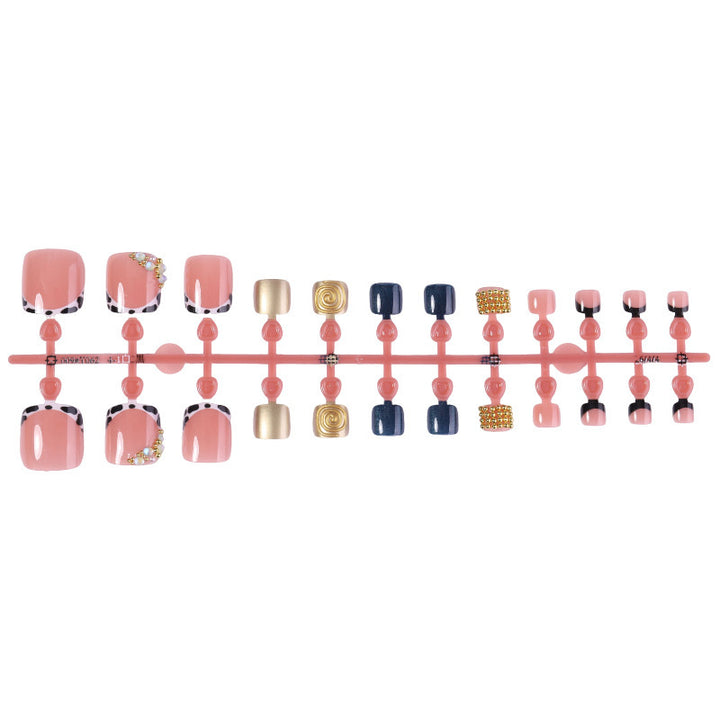 Acrylic nail set with luxurious golden embellishments Stornfield