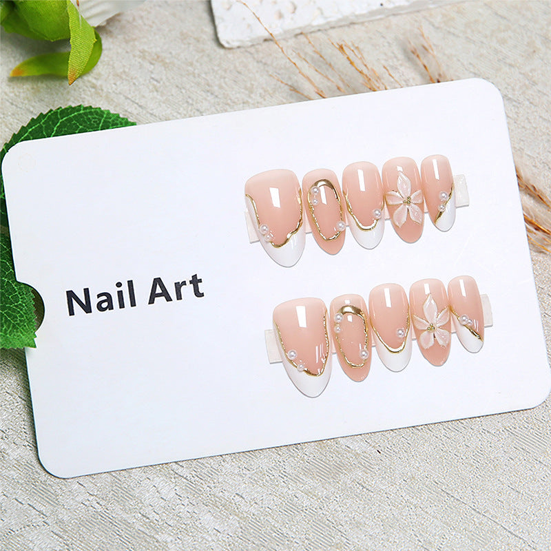 Artistic nail tips with elegant pearl design Stornfield