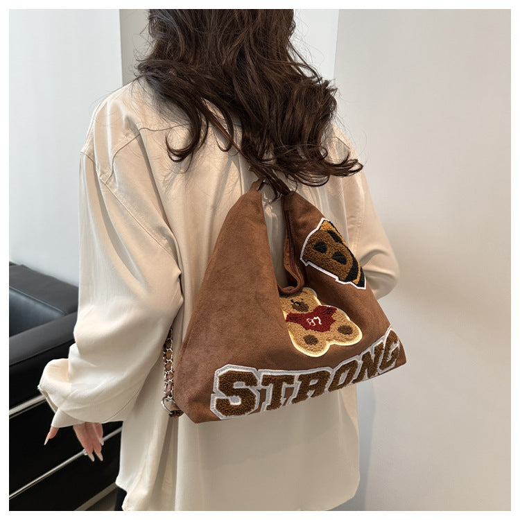 Shoulder bag in playful bear pattern Stornfield