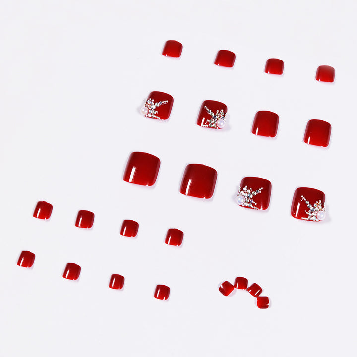Artful toenail design with elegant rhinestone design Stornfield