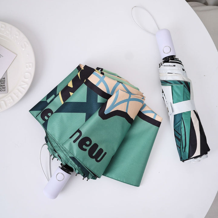 Ladies innovative folding umbrella with unique graphic design Stornfield