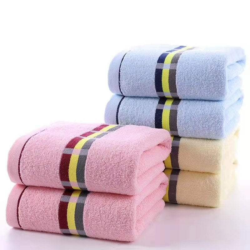 Women’s terry bath towel with elegant striped border Stornfield