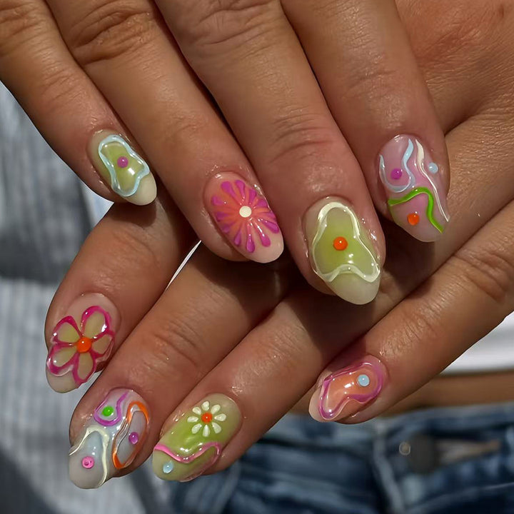 Artificial nails in the creative flower and foil design Stornfield