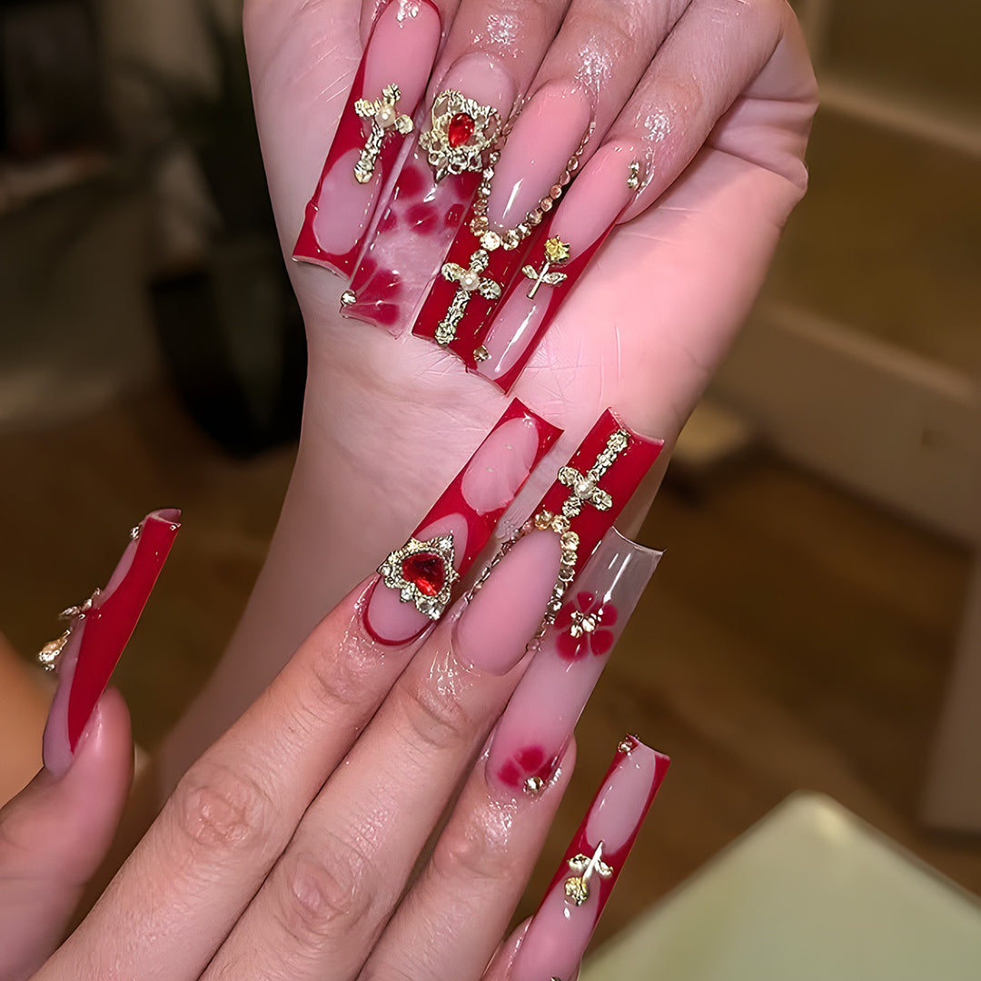 Glamorous Stiletto Press-On Nails with Artistic Gold and Red Accents Stornfield