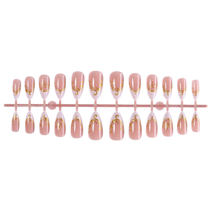 Artificial nail set with elegant gold accents and transparent design Stornfield
