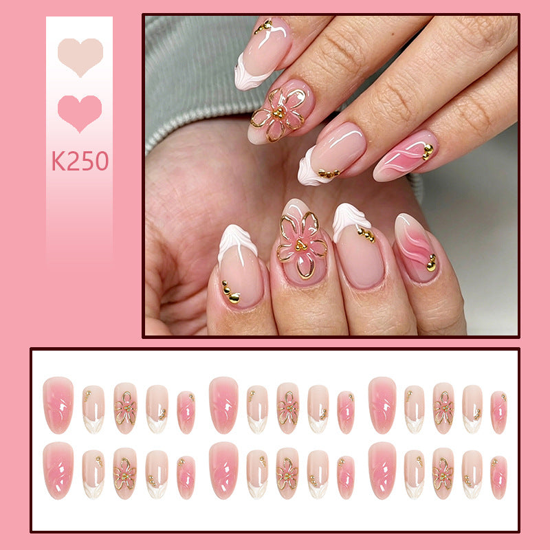Nail set with elegant floral and glitter elements Stornfield