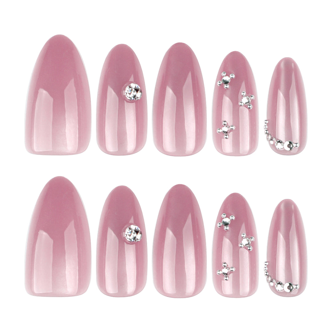Artificial nail art with glitter embellishments Stornfield