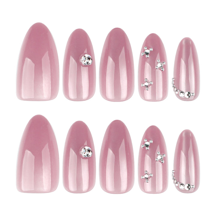 Artificial nail art with glitter embellishments Stornfield