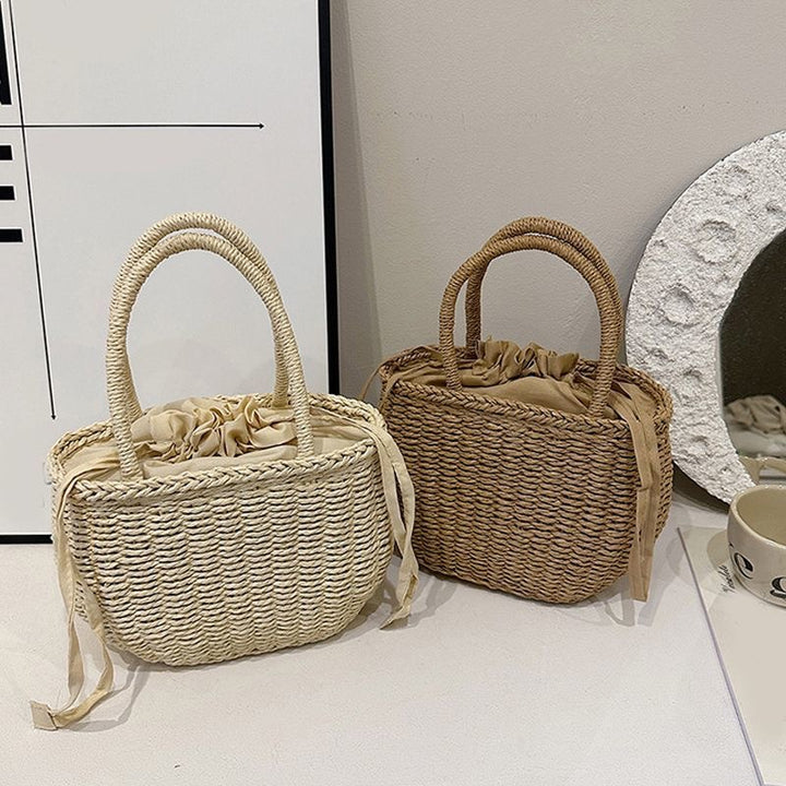 Handwoven basket bag with elegant bow Stornfield