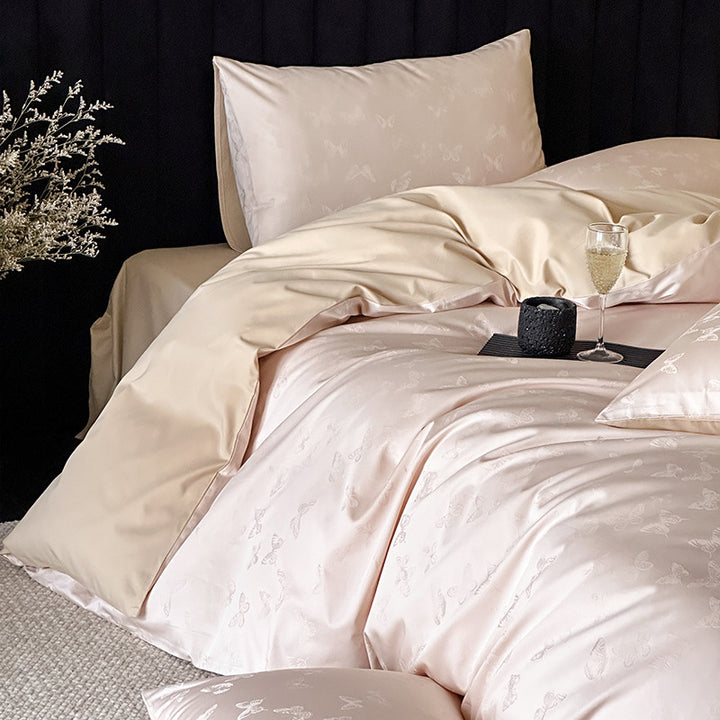 Jacquard bedding set made of cotton satin with subtle butterfly relief and reversible function