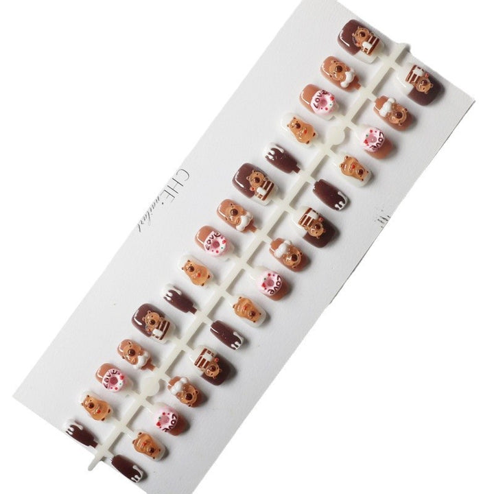 Playful art fake nails with animal motifs Stornfield