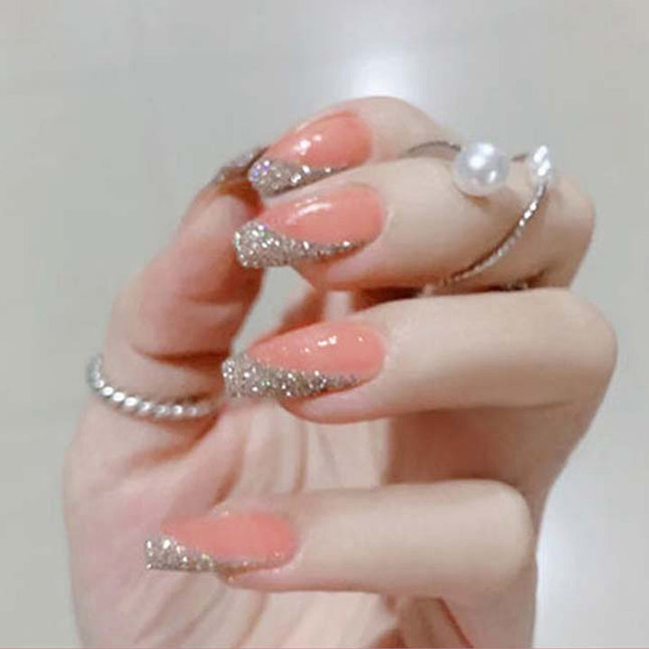 Glamorous artificial nail set with sparkling glitter and French tip Stornfield