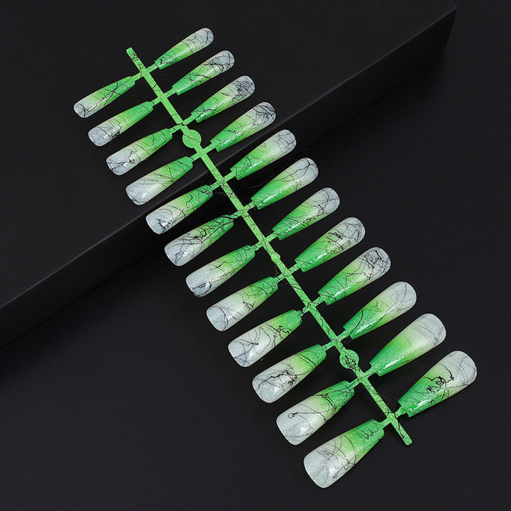 Artificial nails in modern ombre design with marbled accents Stornfield