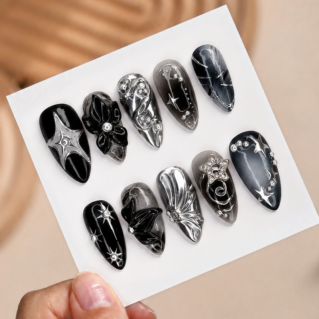 Artificial nail set with glamorous designs and unique 3D elements Stornfield
