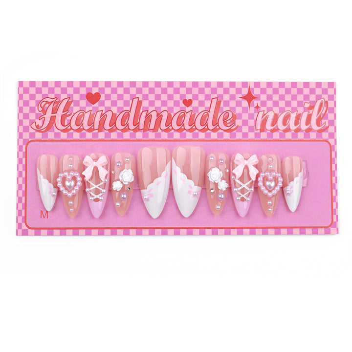 Artful stiletto nails with romantic accents Stornfield