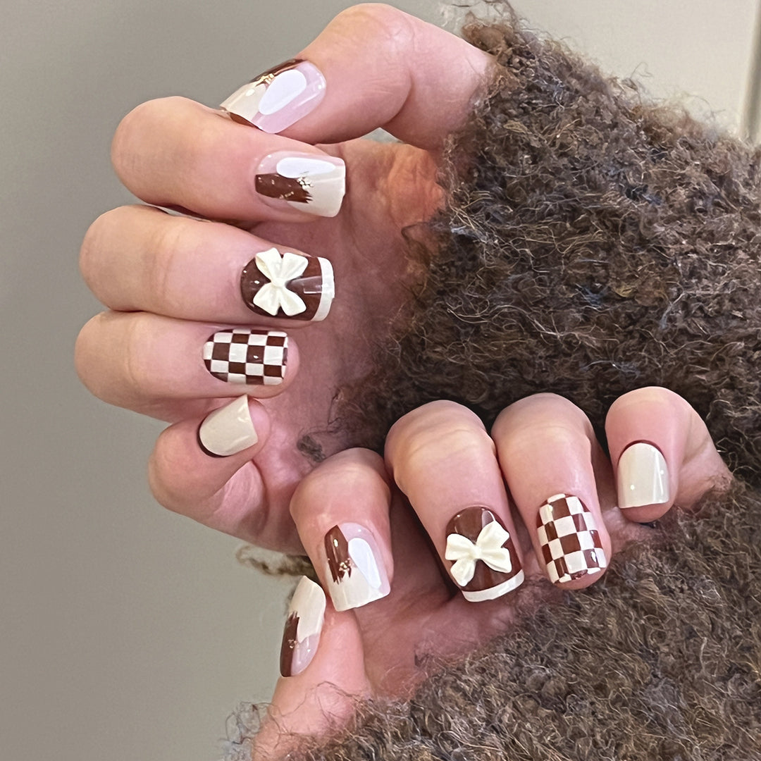 Creative Nail Art with Modern Patterns and Bow Motifs Stornfield