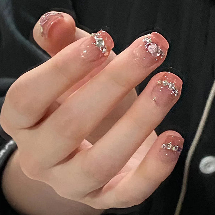 Glamorous nail art with rhinestone details Stornfield