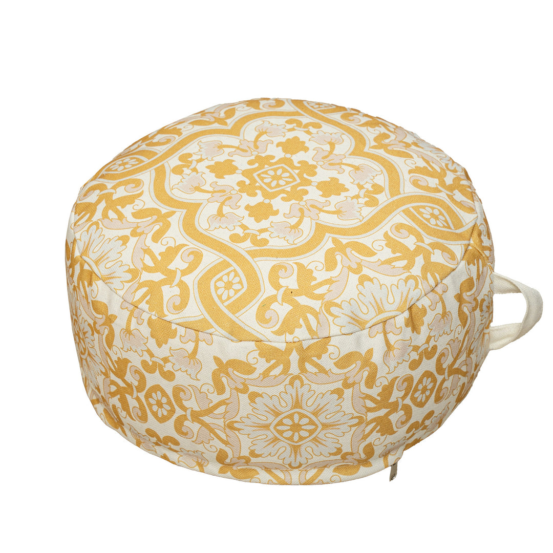 Round floor pouf with woven ornament pattern and carrying handle Stornfield