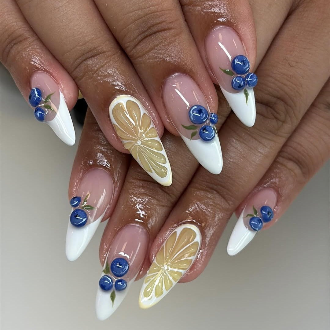 Artificial nails with elegant floral patterns and accents Stornfield