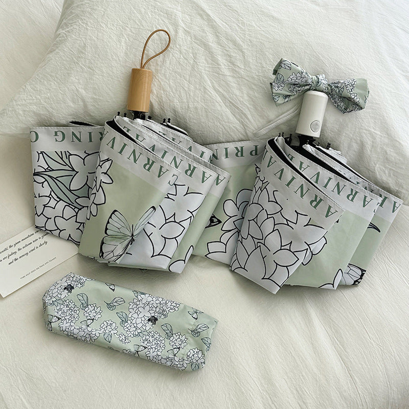 Women's Folding Umbrella with Innovative Floral Design Stornfield