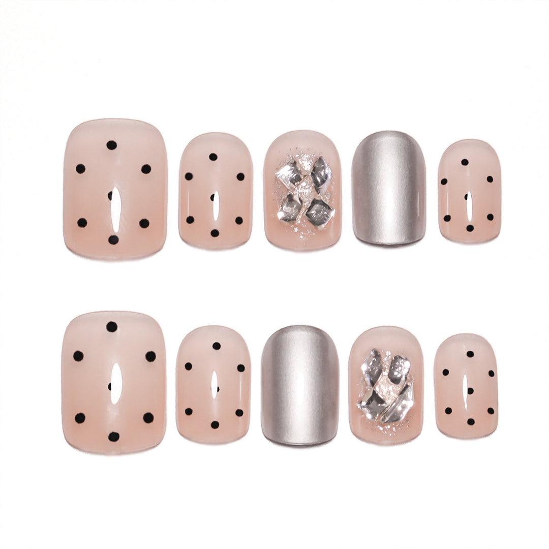Artificial nail extensions with elegant accent decoration Stornfield